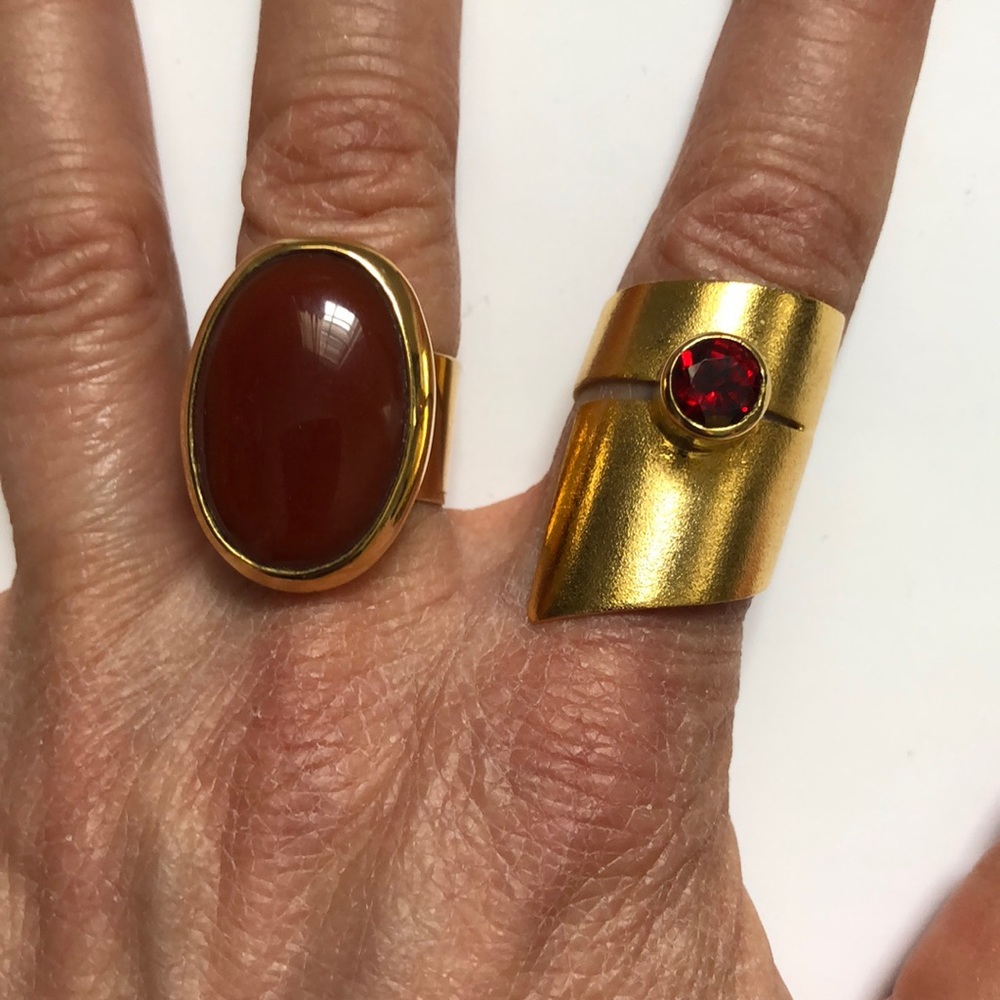 Set of gold tone statement rings.